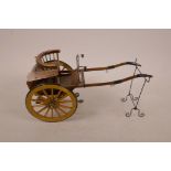 A scratch built treen and metal model of a pony trap, 10" long