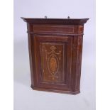 A Victorian inlaid mahogany hanging corner cupboard, 14½" x 14½", 25" high