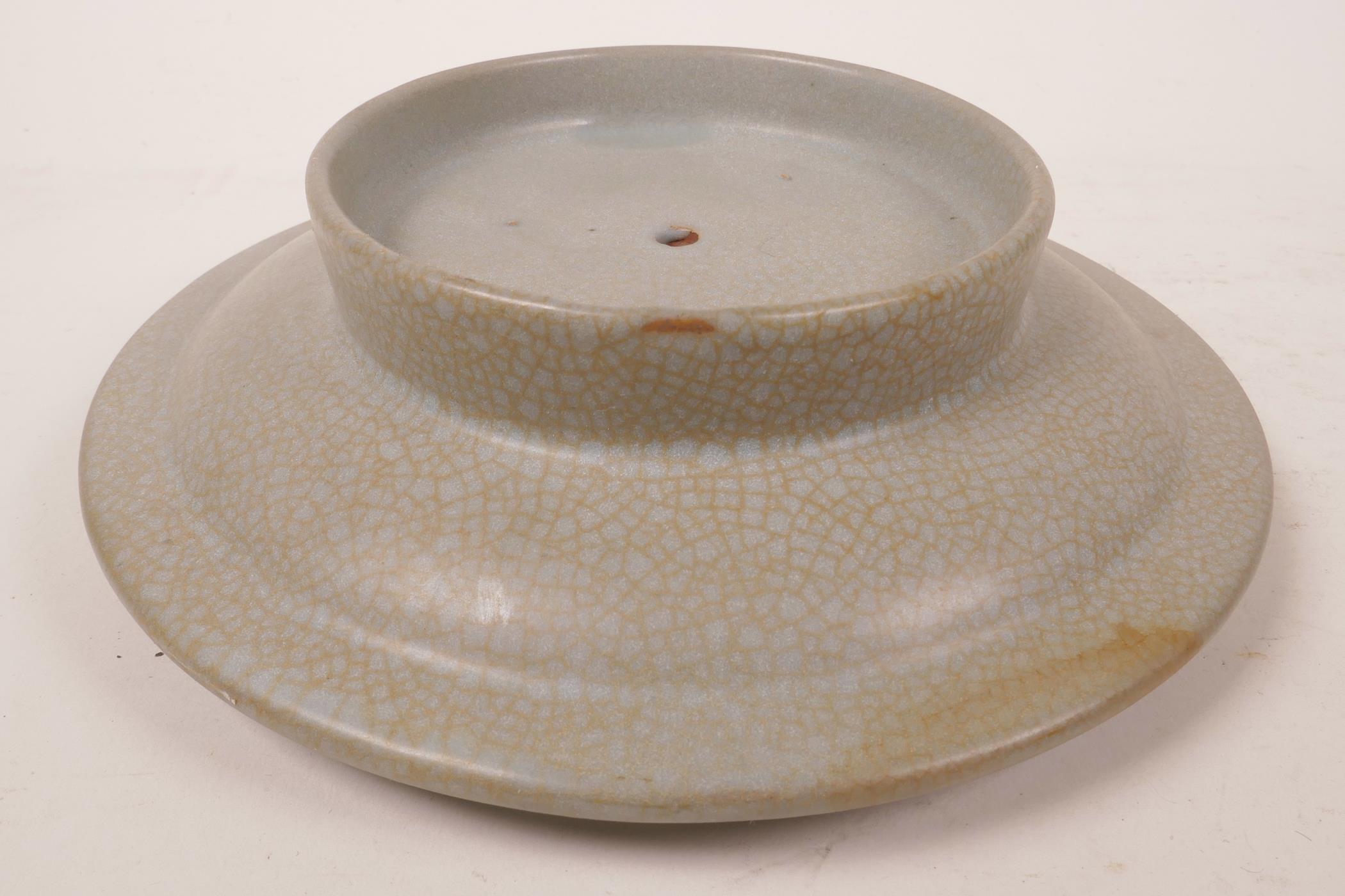 A ceramic stand with a celadon glaze, 7½" diameter - Image 2 of 3
