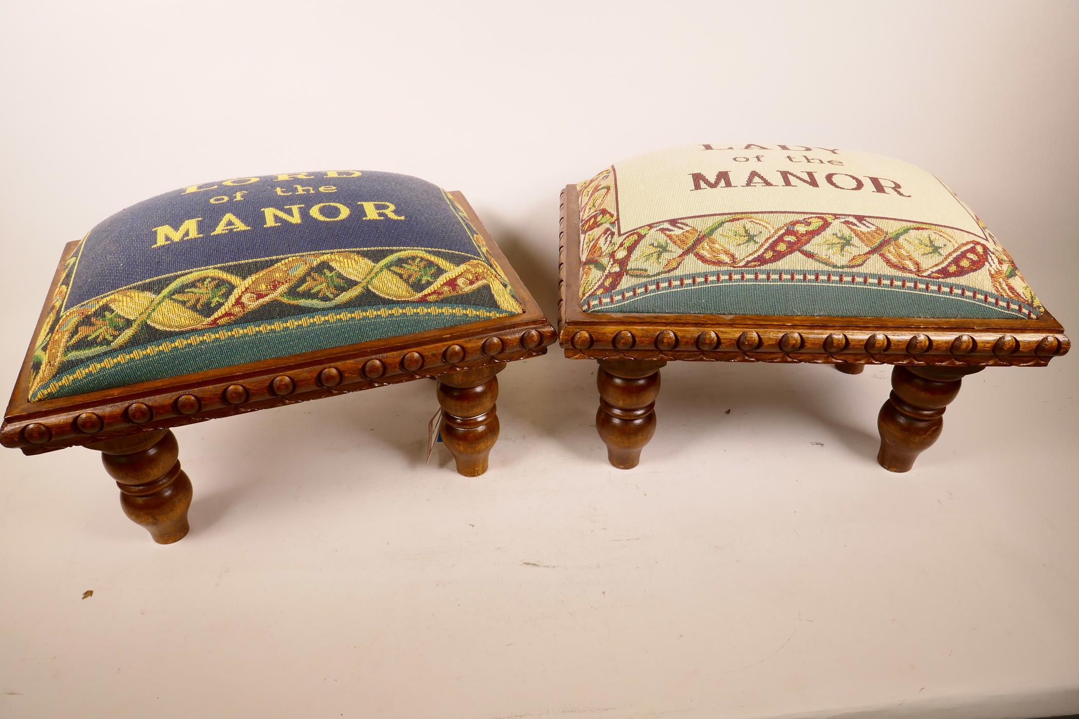 A pair of contemporary footstools with carved decoration on turned supports, the upholstered tops