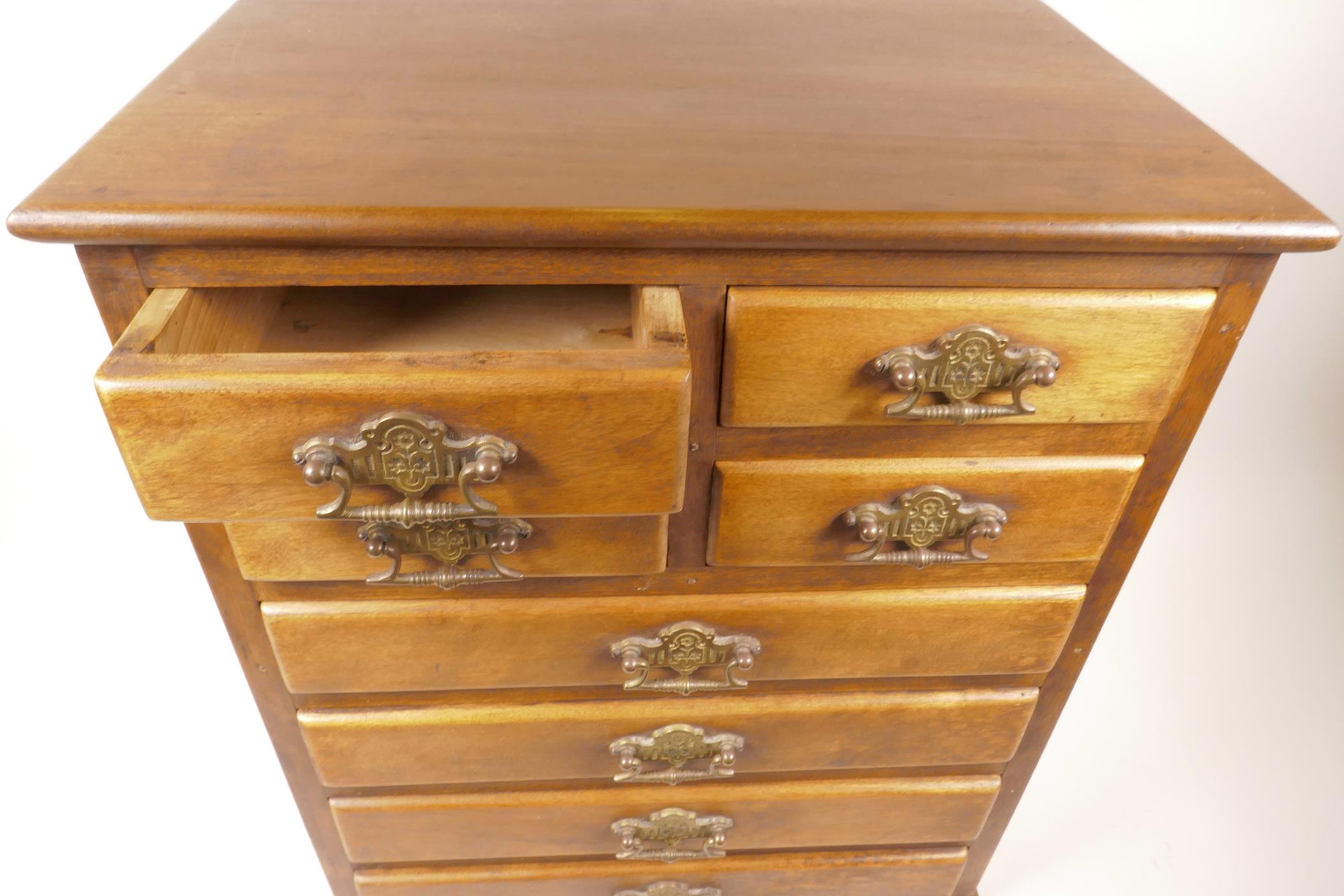 A small hardwood chest of four short over 4 long drawers with brass drop handles, 19" x 16" x 11" - Image 3 of 4