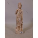 An oriental carved weathered marble figure of Quan Yin, 18" high