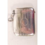 A silver vesta case with ribbed decoration, hallmarked Birmingham 1937, by Joseph Gloster Ltd, 2.98g