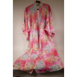 A Japanese lady's kimono, pink and multicolour floral 100% silk, labelled 'Made in Japan' fully