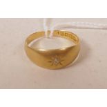 An 18ct gold gypsy ring set with single diamond, size Q/R, gross 2.6g