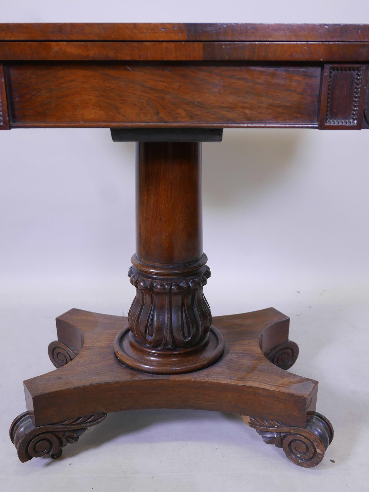 A William IV overgrained rosewood fold over card table, with inset baize top, raised on carved - Image 3 of 7