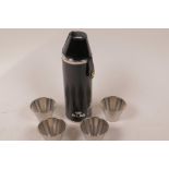 Airline memorabilia, a KLM leather covered stainless steel flask with four stirrup cups