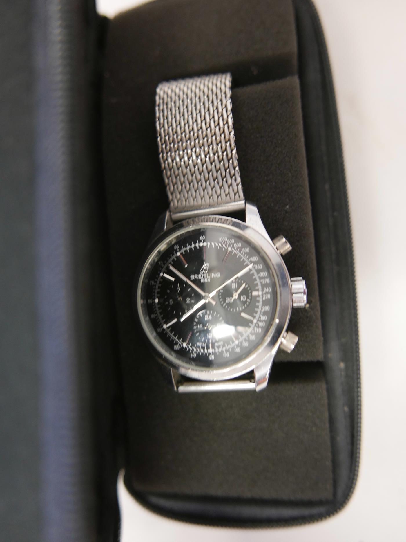 A gentleman's stainless steel wristwatch on chain link stainless steel bracelet, A/F, in a Breitling - Image 3 of 4