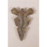 An IndoPersian bronze pendant decorated with lions, a snake, tortoise etc, 3" x 4"