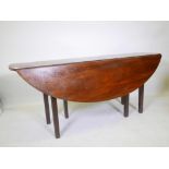 A C19th Irish mahogany wake table on reeded supports, 16½" x 68" x 28" high, 45½" x 68" open