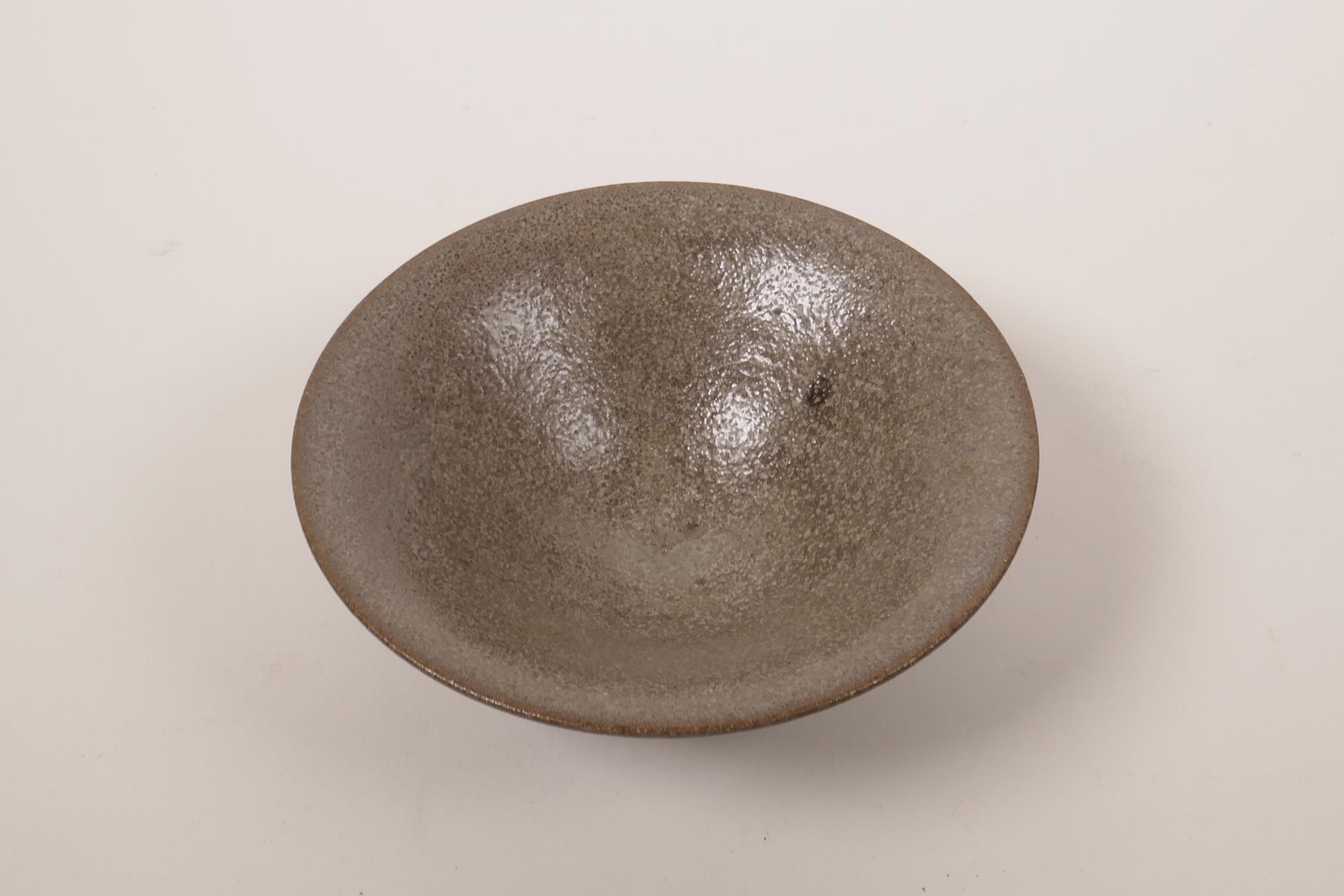 A Chinese Cizhou kiln pottery bowl with a grey glaze, 5½" diameter - Image 2 of 3