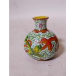 A Peaking glass vase with dragon decoration in bright enamels, 4" high