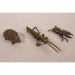 Three Japanese bronzed metal Jizai style figures of a beetle, grasshopper and hedgehog, longest 4½"