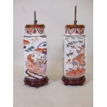 A pair of oriental ceramic table lamps with Imari style decoration, 17"