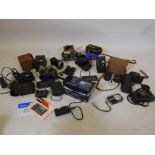 A quantity of cameras, including a box brownie and a pair of C19th opera glasses in case