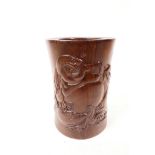 A hardwood oriental brush pot with carved decoration of Buddha and calligraphy, 6" high x 4" wide