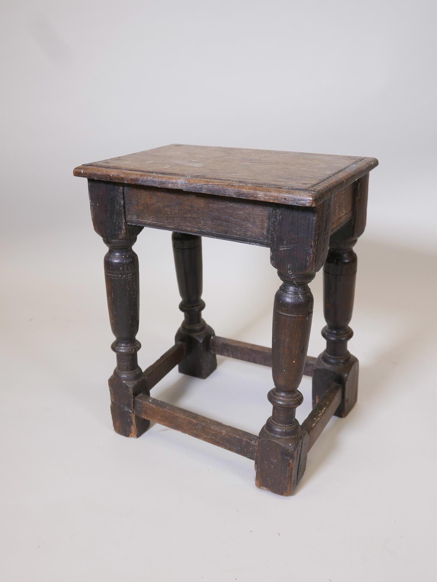 A C18th oak joint stool, 11" x 16", 19½" high