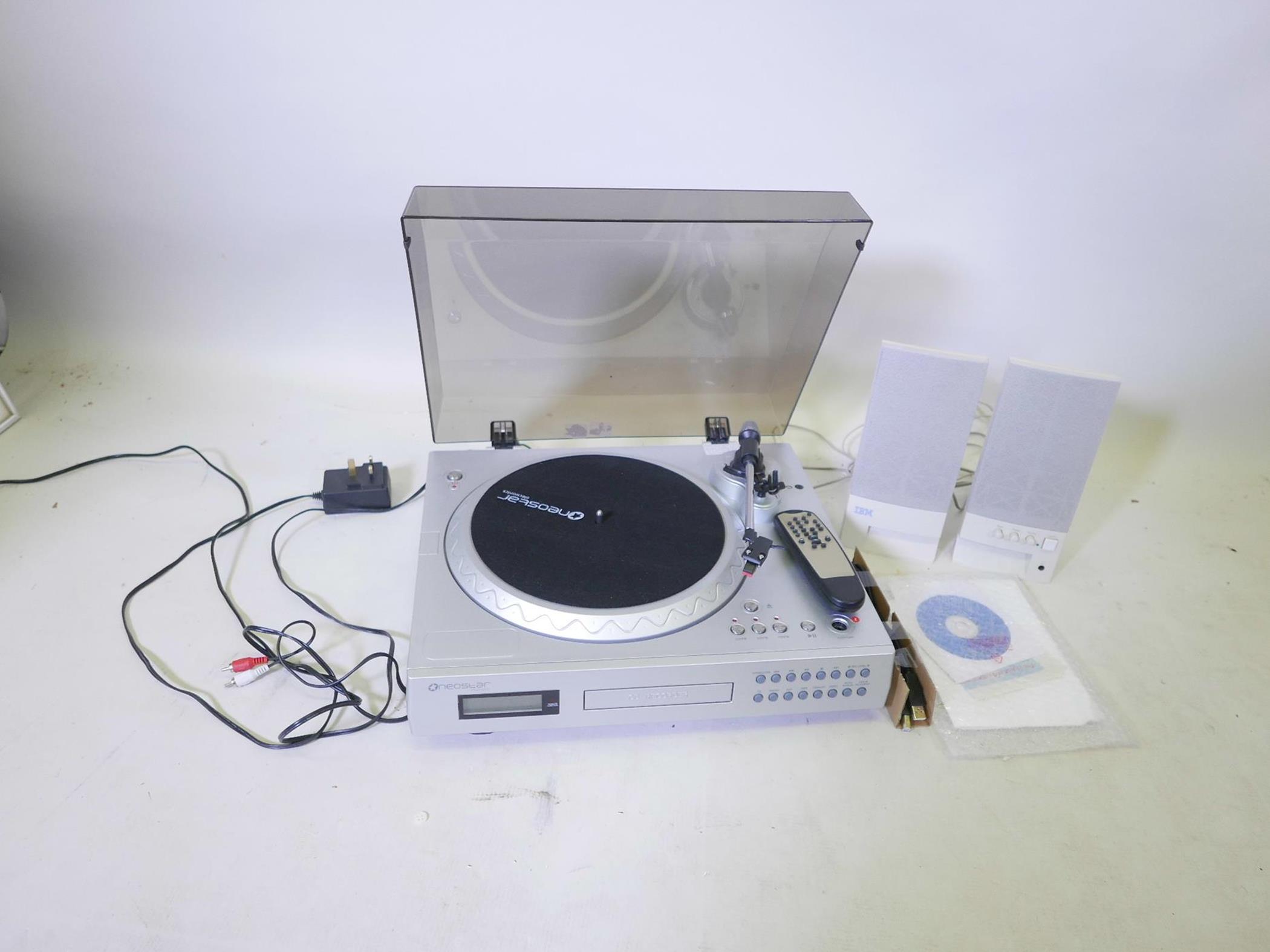 A Neostar NTC D1V turntable, cassette, CD player/recorder, with aux function USB to PC recording,