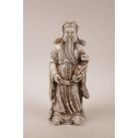 A Chinese glass figure of an immortal, impressed seal mark to base,