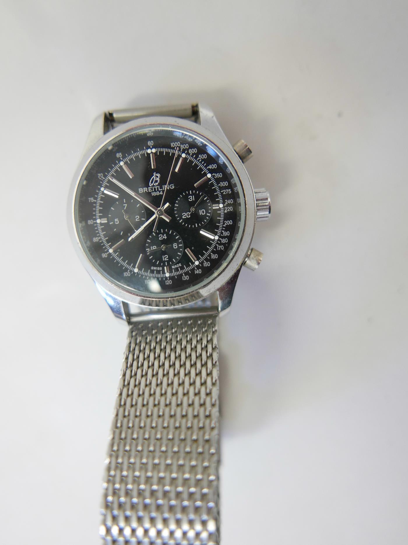 A gentleman's stainless steel wristwatch on chain link stainless steel bracelet, A/F, in a Breitling - Image 2 of 4