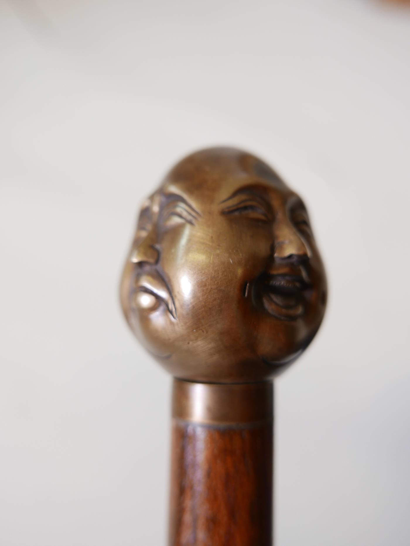 A hardwood walking stick with brass four-face Buddha head handle, 36" long - Image 3 of 4