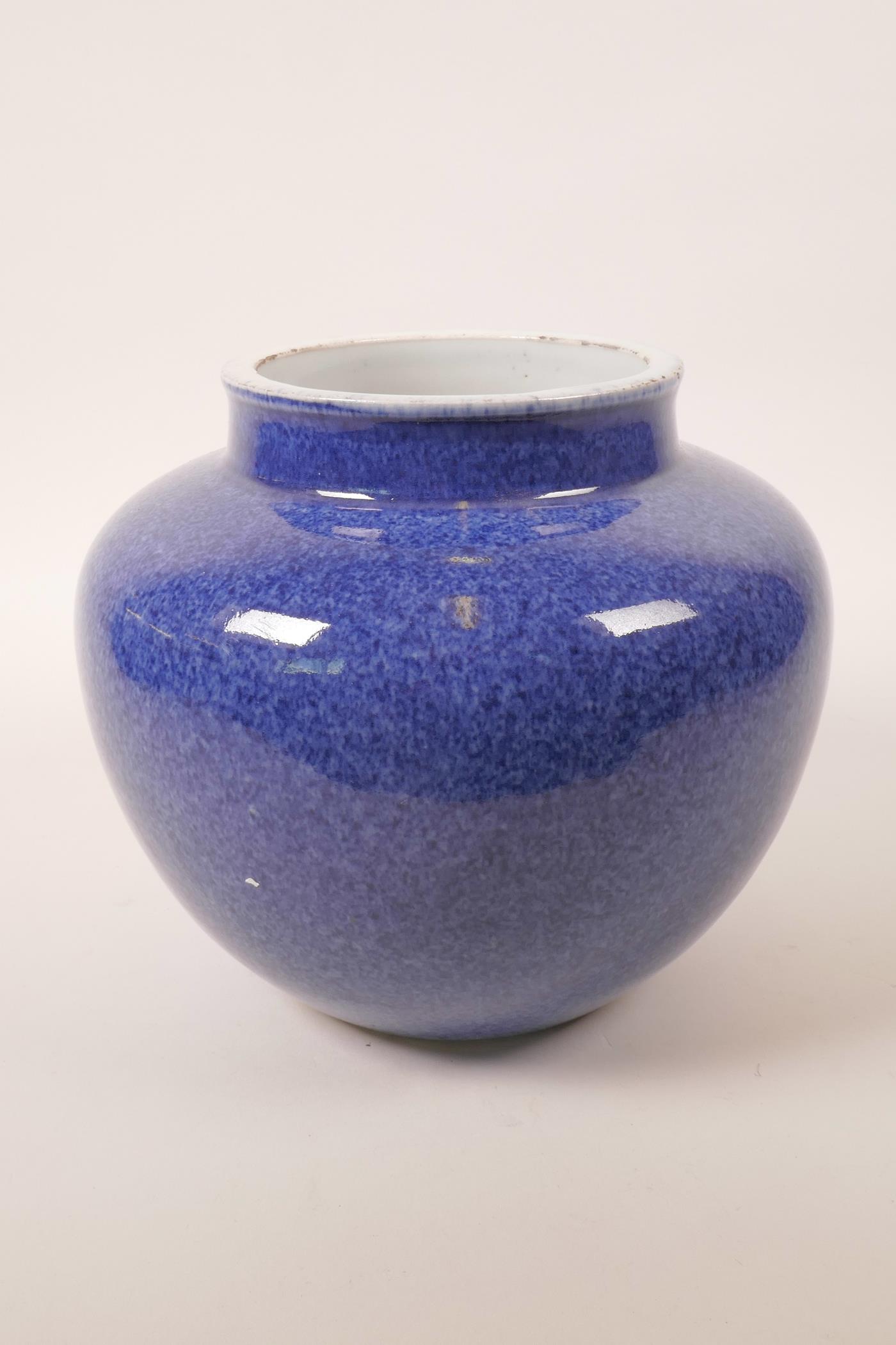 A Chinese mottled blue glaze pottery jar, 7½" high, 9" diameter