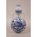 A Chinese blue and white porcelain garlic head flask with two handles and dragon decoration, six