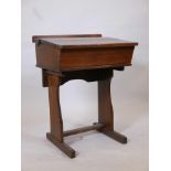 An early C20th oak school desk, 24" x 19" x 32" high