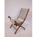 A late C19th beechwood folding campaign chair
