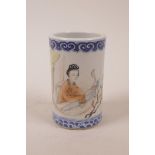 A Chinese blue and white porcelain brush pot with polychrome enamel decoration of a lone figure,
