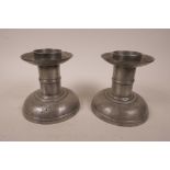 A pair of antique French pewter dwarf candlesticks, 5" high