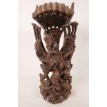 A 1940s Balinese hard wood carving of Vishnu riding Garuda, beautifully carved, A/F, 15" high x 6"