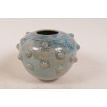 A Chinese porcelain vase with studded decoration and high fire blue/green glaze, 4½" high
