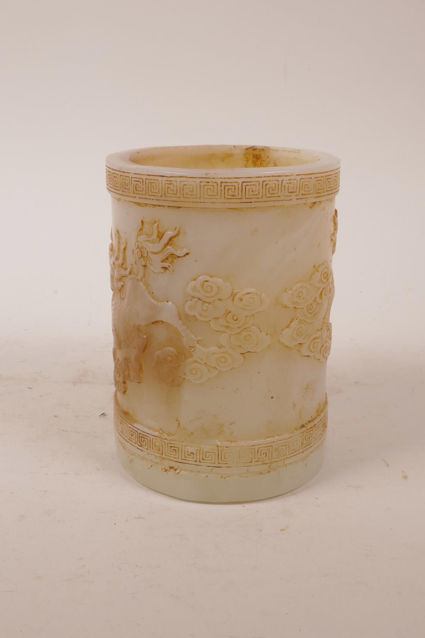 A Chinese moulded glass brush pot with raised decoration of kylin and the flaming pearl, 5" high x - Image 3 of 5