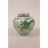 A Chinese porcelain ginger jar and cover, with green enamel dragon and flaming pearl decoration, six