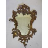 A French bronze mirror with swag and floral decoration, 21" x 32"