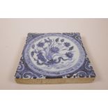 A Chinese blue and white porcelain tile with lotus flower decoration, 8" x 8"