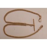 A 9ct gold curb link double albert chain with T bar and two dog clips, gross 18g