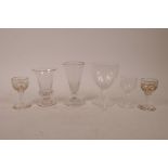 A collection of six C19th and early C20th glasses to include an early cordial glass with rolled