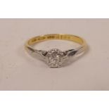 An 18ct gold and diamond set ring, approx size J