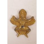 A Tibetan gilt metal figure of Garuda, 3½" x 3"