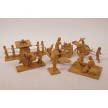 Seven Chinese boxwood carvings of figures at various pursuits, figures with palanquin 7" long
