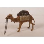 A Bergman style cold painted bronze pin cushion in the form of a camel, 3" high x 4½" long