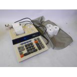 A Casio DR-120V electronic printing calculator