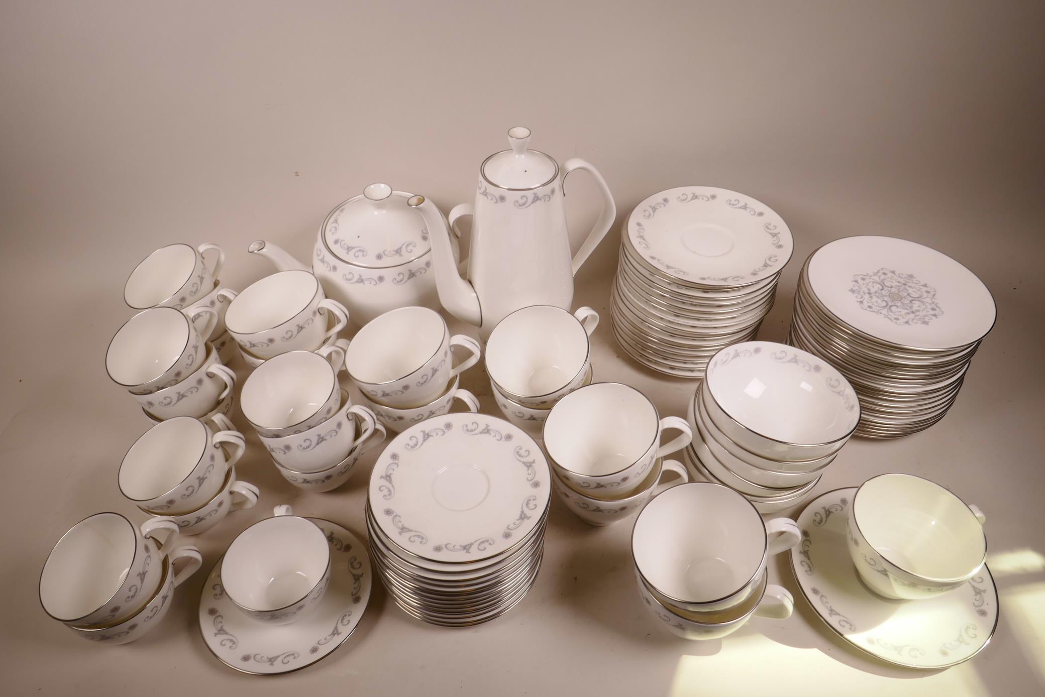 A large quantity of Royal Worcester English fine bone china, Bridal Lace, Berkeley shape coffee