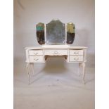 A French style painted kidney shaped dressing table, raised on cabriole supports, 52" x 20" x 49"