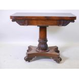 A William IV overgrained rosewood fold over card table, with inset baize top, raised on carved