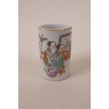 A Chinese polychrome porcelain brush pot decorated with two ladies seated at a table, seal mark to