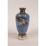 A Japanese cloisonne vase with a hallmarked silver mount, the body decorated with a phoenix in