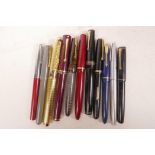 A collection of eleven vintage fountain pens including Sheaffer, Waterman, Swan etc